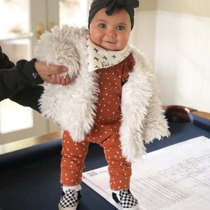 Rust with white polka dot ruffled jumpsuit